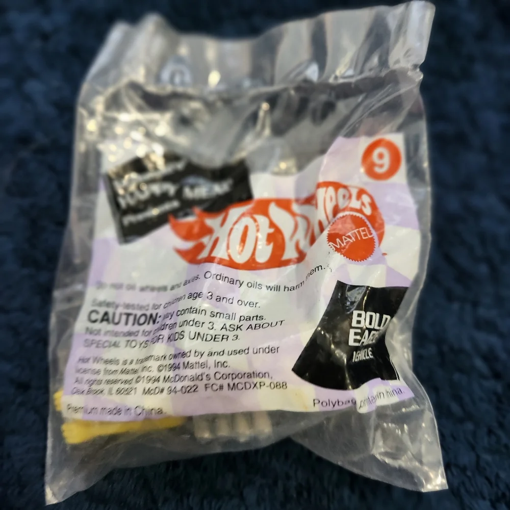 collection of three vintage 1994 McDonald's Happy Meal Hot Wheels toys